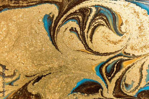 Gold marbling texture design. Blue and golden marble pattern. Fluid art.