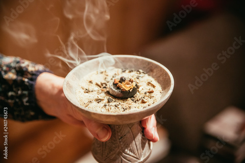 Fotografie Traditional (esoteric) incense ritual at Sylvester and Christmas, smoke