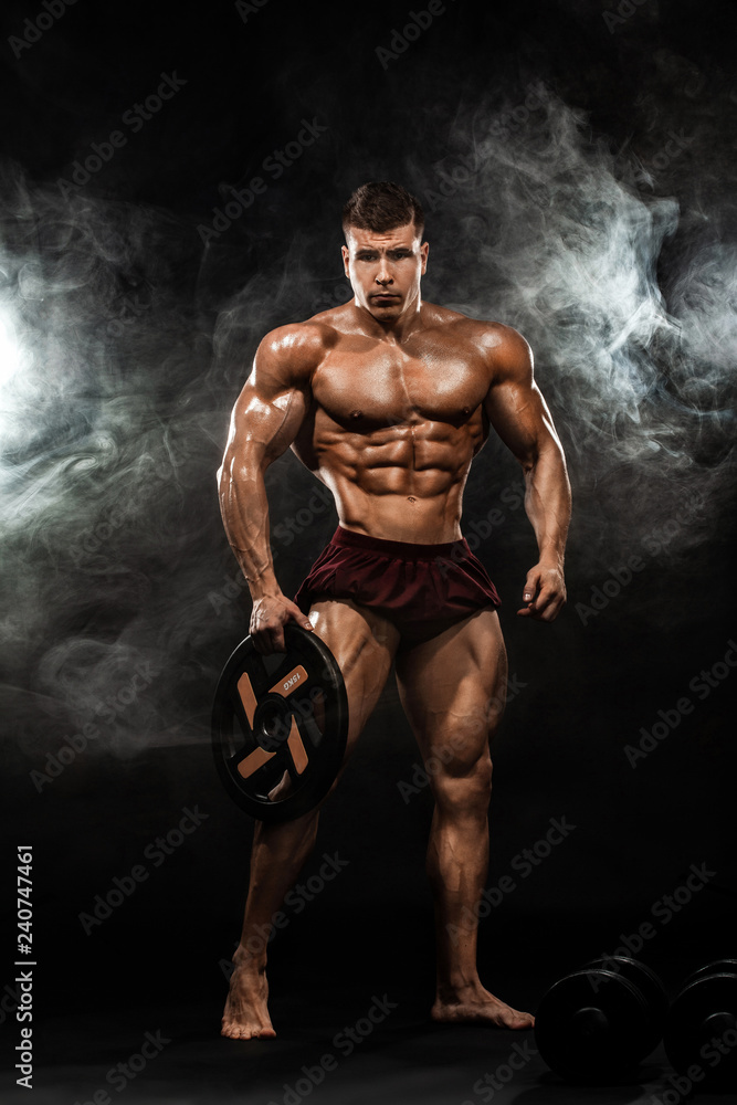 Advertising shot of a extreme bodybuilders in the gym. Concept