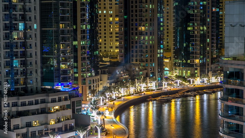 Promenade in Dubai Marina timelapse at night, UAE. Top view