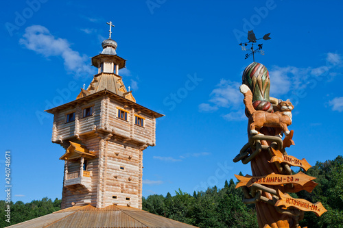 Orthodox water source Gremyachy and wooden church. photo