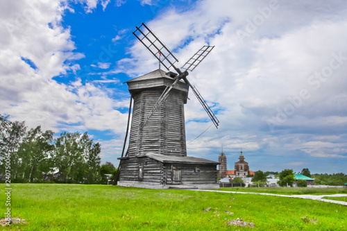 Windmill in the green field