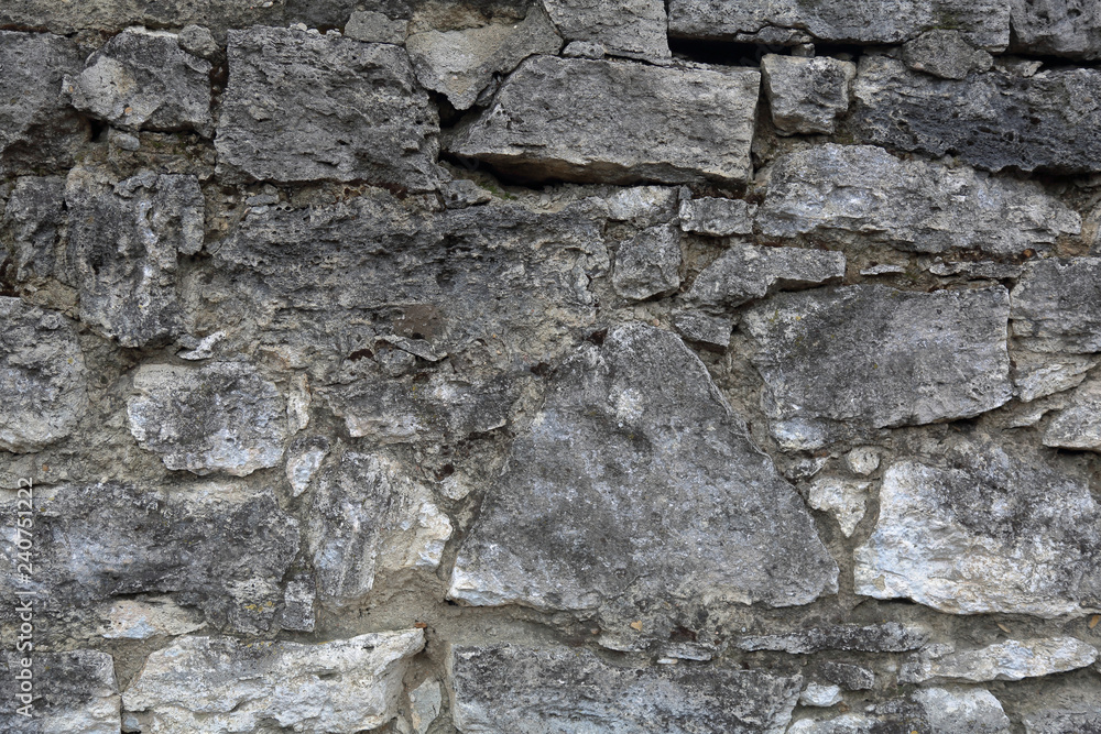 Original textured surface of of a natural coarse stone