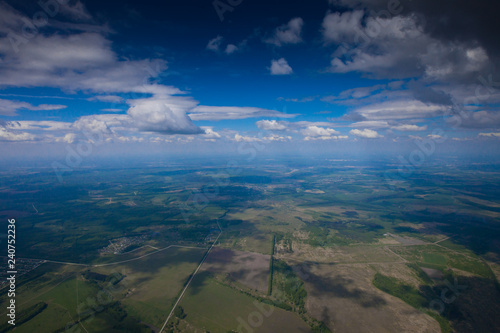 The flight under the blue sky over the summer plain. © Mikhail Semenov