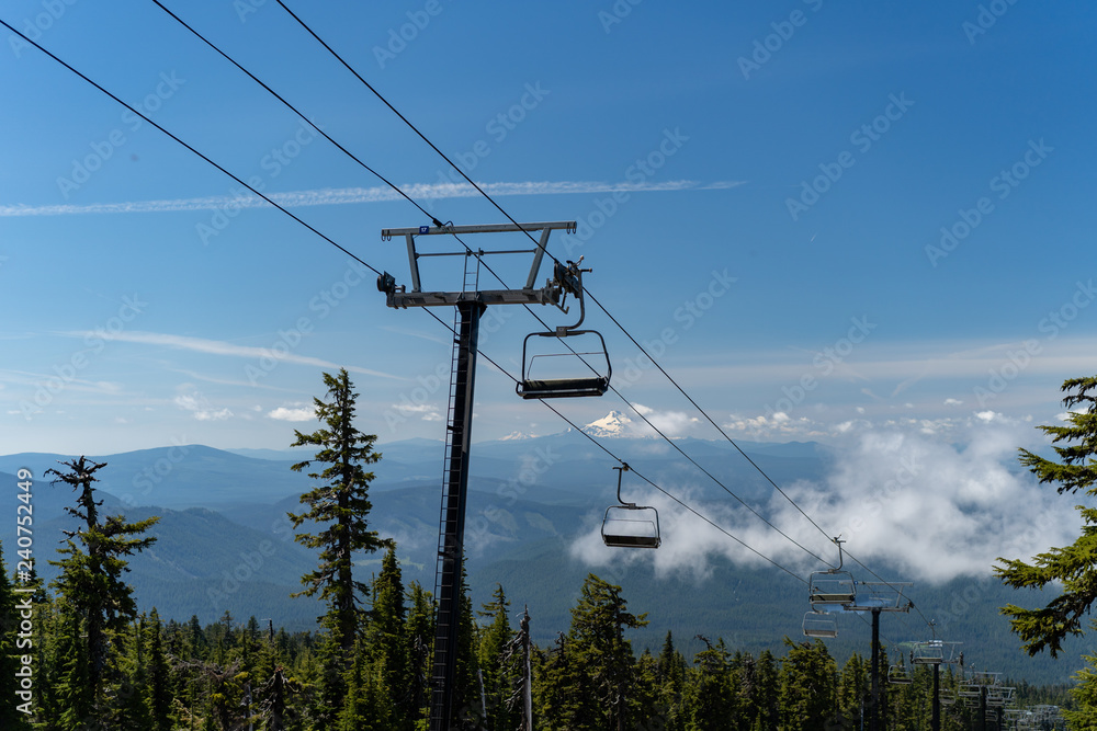 Mt. Hood in the Pacific Northwest state of Oregon. Mount Hood ski resort during the summer months on vacation. Mt. Hood in the Pacific Northwest state of Oregon. Mount Hood ski resort during the summer months on vacation.
