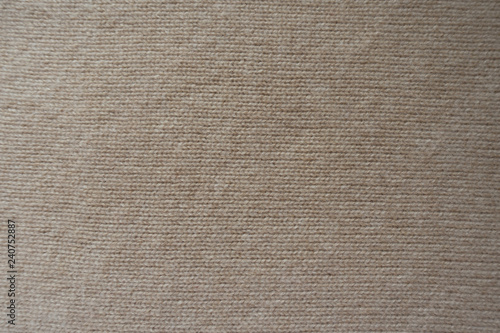 Backdrop - simple beige knitted fabric from above