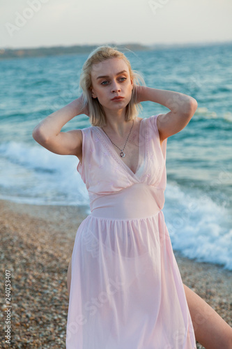 beautiful fashionable woman in bathing suit on the Beach Ocean