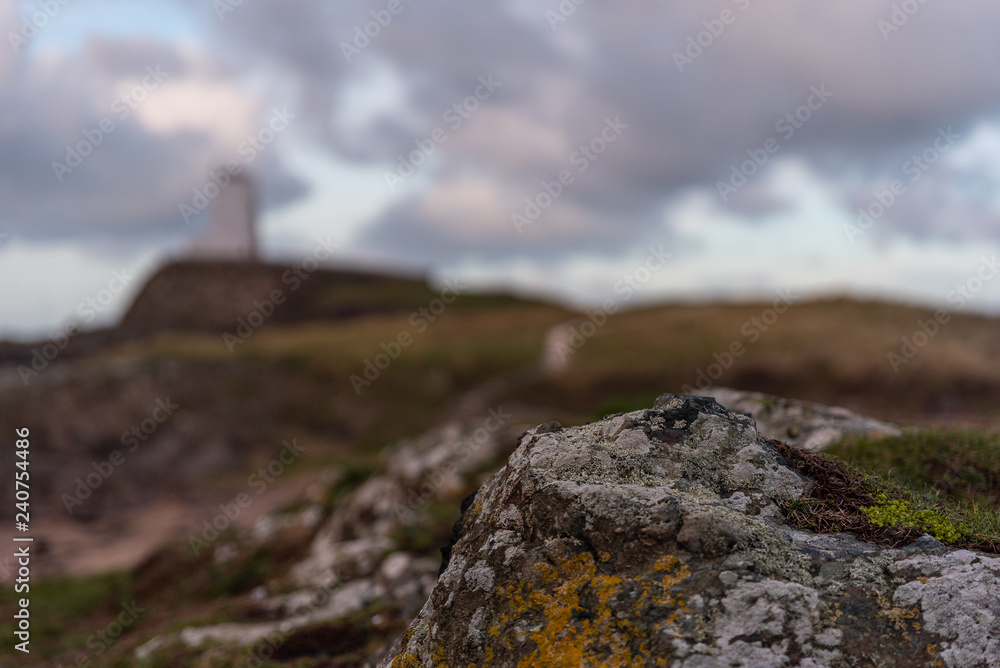 Fototapeta premium The Llanddwyn island lighthouse, Twr Mawr at Ynys Llanddwyn on Anglesey, North Wales.