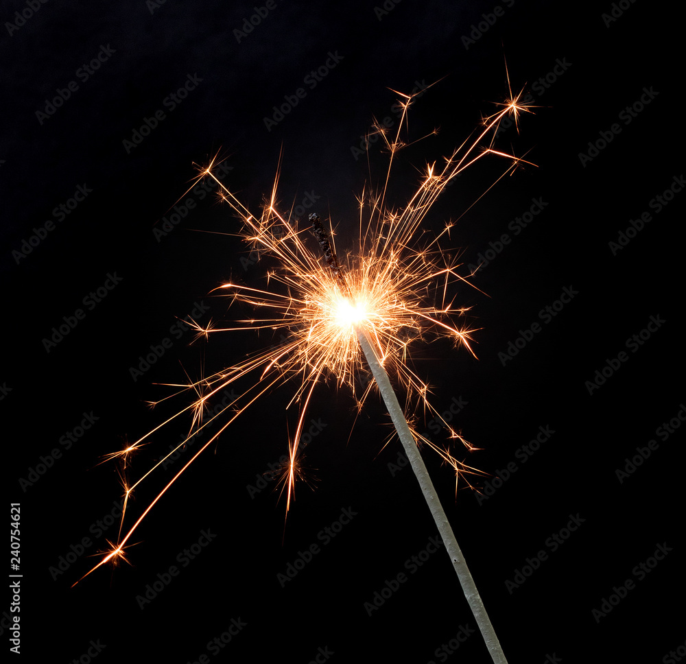 Fototapeta premium Sparkler isolated on black