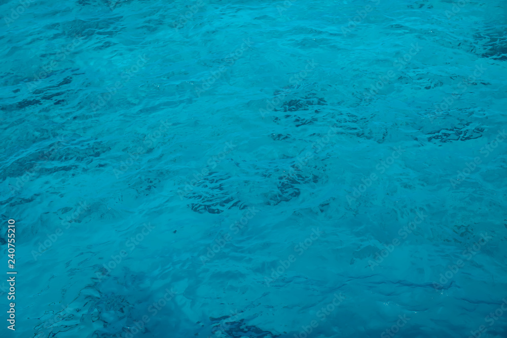 Background shot of blue aqua sea water surface Background shot of blue aqua sea water surface