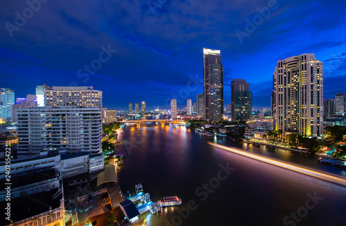 Bangkok skyline river view business and travel district at dusk blue hour. © newroadboy