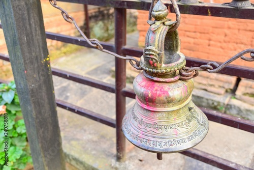 Close-Up View of a Golden Nepali Temple Bell