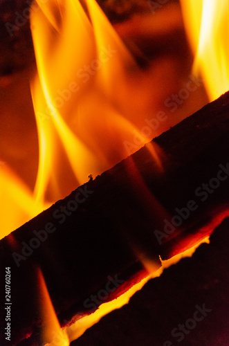 Fire like dancing and burning some woodsticks photo