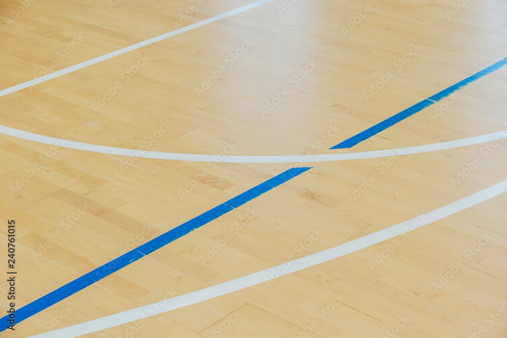 wooden floor volleyball, basketball, badminton, futsal, handball court with light effect Wooden floor of sports hall with marking lines line on wooden floor indoor, gym court