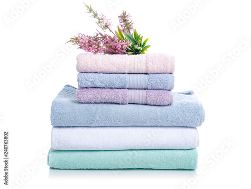 Stack towels flowers soft on white background isolation