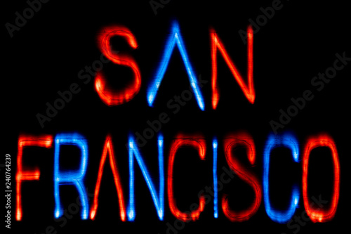 Light painting. City name. SAN FRANCISCO. Blue and red colors.