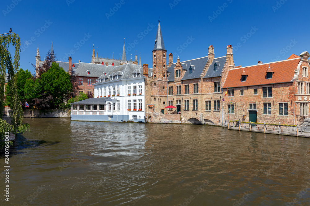Naklejka premium Brugge. Medieval houses over the canal.