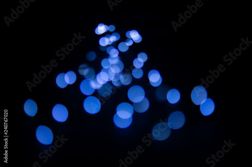 Blurred background with blue glows in the center