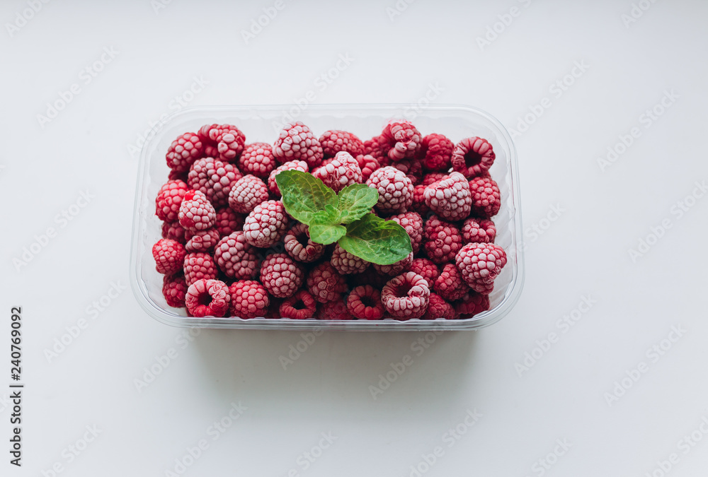 Frozen raspberries and fresh mint Frozen raspberries and fresh mint