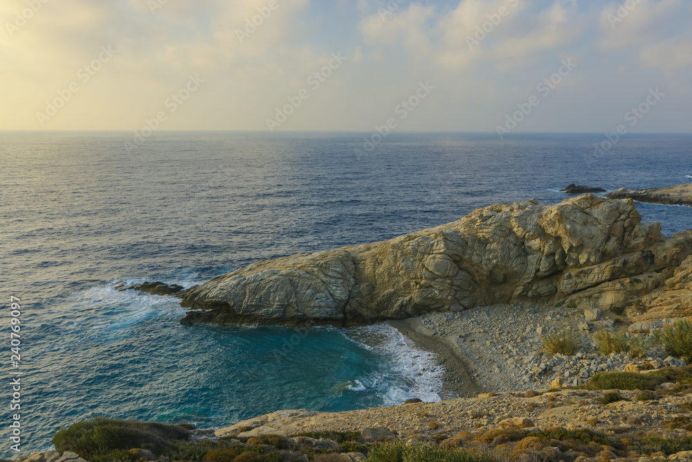 panorama view to a beautiful hidden bay - gorgeous rough and rocky coast on Ikaria island