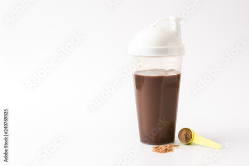 Chocolate protein shake isolated on white background. Copyspace