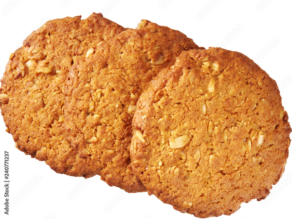 Three oatmeal cookies on a white background Three oatmeal cookies on a white background