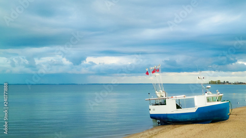 Fishing boat on Baltic Sea coast.
