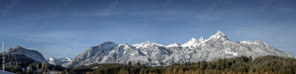 panorama of mountain chain hahnenkamm in reutte tirol at winter