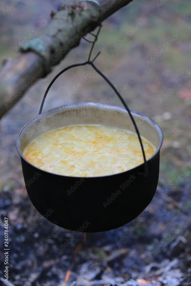 soup is cooked in smoked tourist kettle soup is cooked in smoked tourist kettle