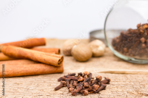 Spice Jar with Cloves and Cinnamon Sticks