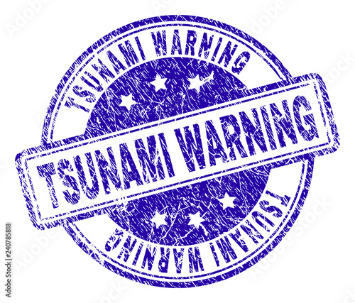 TSUNAMI WARNING stamp seal imprint with grunge style. Designed with rounded rectangles and circles. Blue vector rubber print of TSUNAMI WARNING tag with grunge texture.