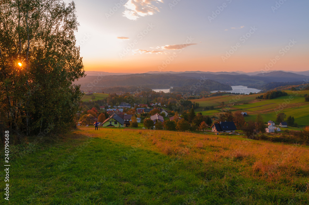 Obraz premium Polanczyk, Bieszczady Mountains, Poland: Sun rising over Solina Lake. Views from near hill.