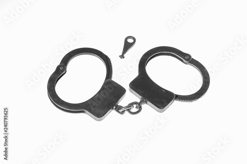 Police metal handcuffs isolated on white background.