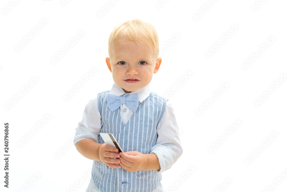 Good purchase. Boy child with credit card. Little cardholder. Little boy keep business card. Small child do credit card payment. Money transaction. Getting business credit, copy space Good purchase. Boy child with credit card. Little cardholder. Little boy keep business card. Small child do credit card payment. Money transaction. Getting business credit, copy space