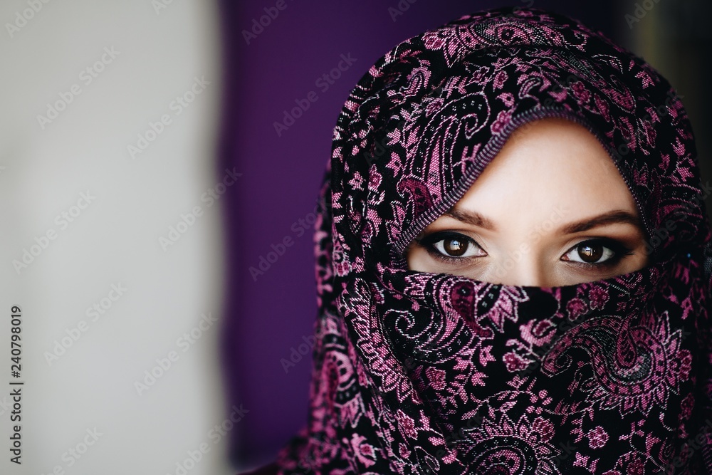 Portrait of scared beautiful arabic middle eastern woman