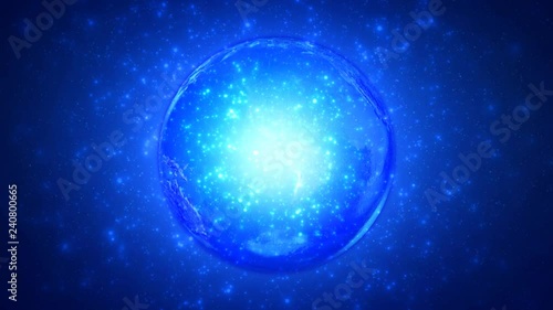 Wallpaper Mural Blue Particle Magic Spinning Globe 4K Loop features a glassy looking globe spinning in a blue gradient atmosphere with white particles flowing through and around the globe toward the viewer in a loop Torontodigital.ca