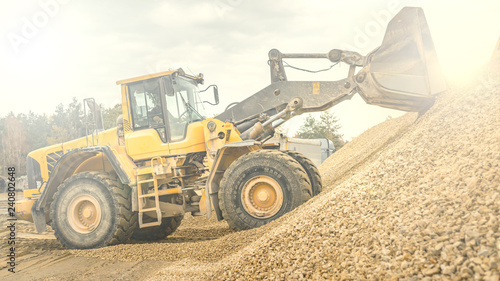bulldozer at work, loading of aggregates