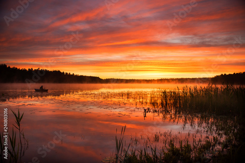 Summer sunrise over lake in Poland