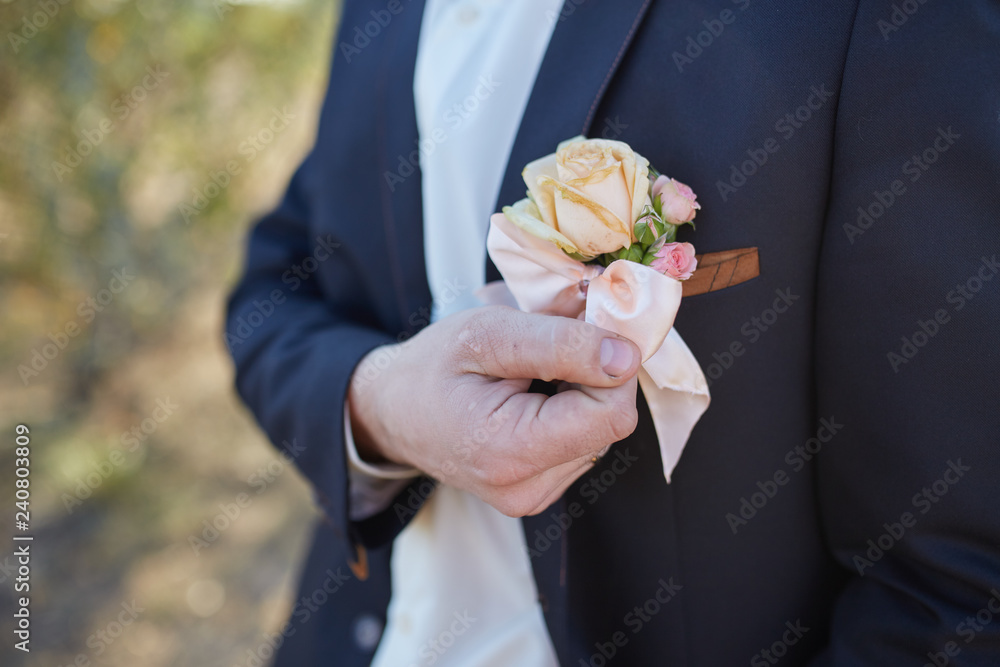 Hands of groom getting ready in suit Hands of groom getting ready in suit