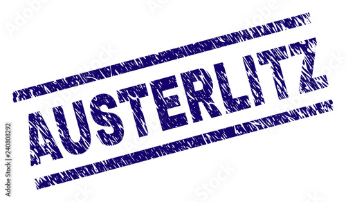 AUSTERLITZ seal stamp with distress style. Blue vector rubber print of AUSTERLITZ text with retro texture. Text label is placed between parallel lines.