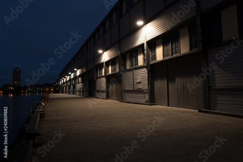 old warehouse on a wharf at night