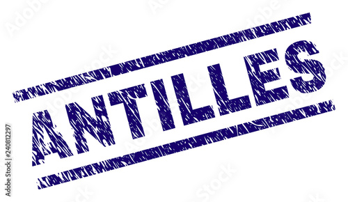 ANTILLES seal print with distress style. Blue vector rubber print of ANTILLES label with corroded texture. Text label is placed between parallel lines.