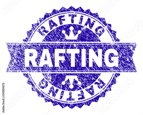 RAFTING rosette seal watermark with grunge style. Designed with round rosette, ribbon and small crowns. Blue vector rubber watermark of RAFTING tag with dirty style.