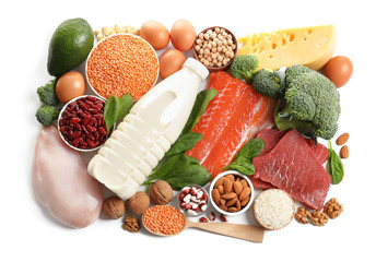 Set of natural food high in protein on white background, top view
