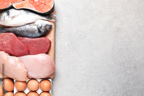 Photography Set of natural food high in protein and space for text on grey background, top v