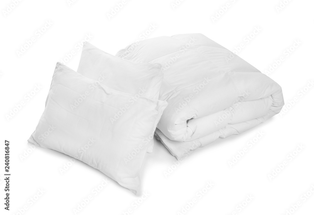 Clean blanket and pillows on white background Clean blanket and pillows on white background