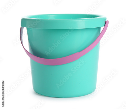 Small plastic bucket on white background. Beach toy