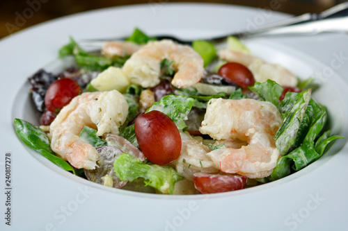 A Waldorf salad with shrimp.