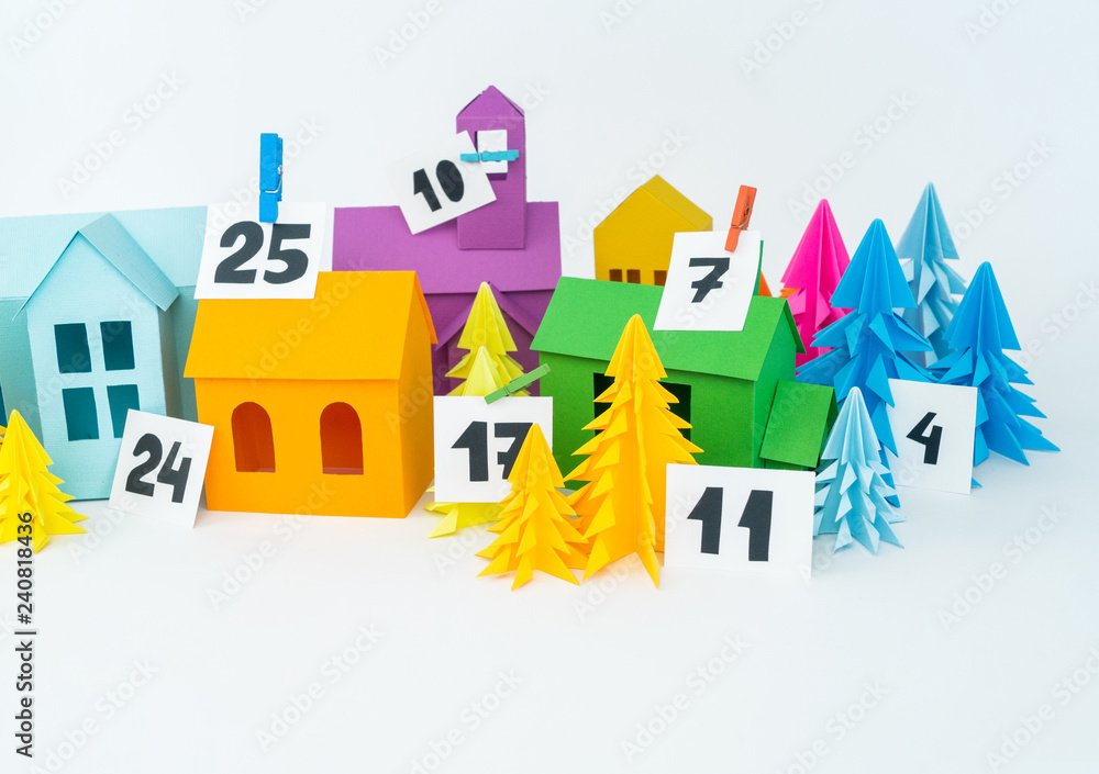 Advent calendar for kids rainbow color. House and Christmas tree paper craft.