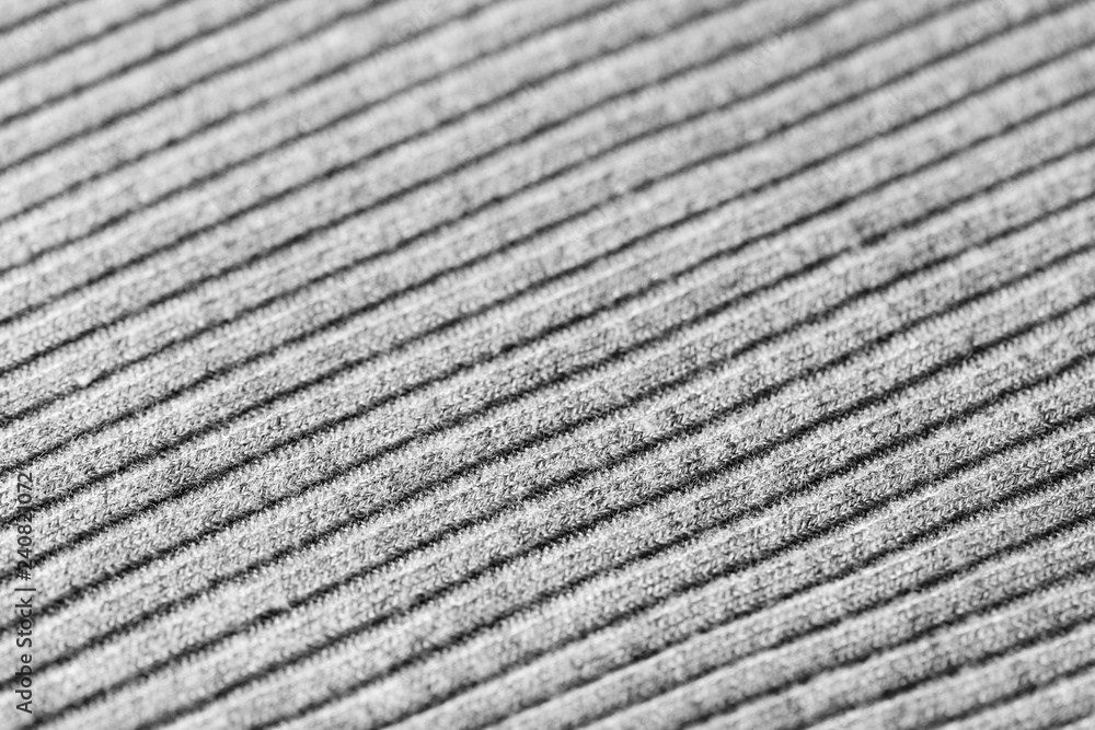 Gray knitwear as a texture and background close up Gray knitwear as a texture and background close up